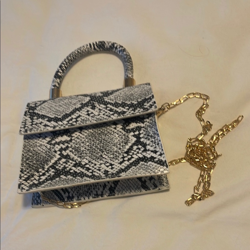Elegant Black and White Snake Print Handbag